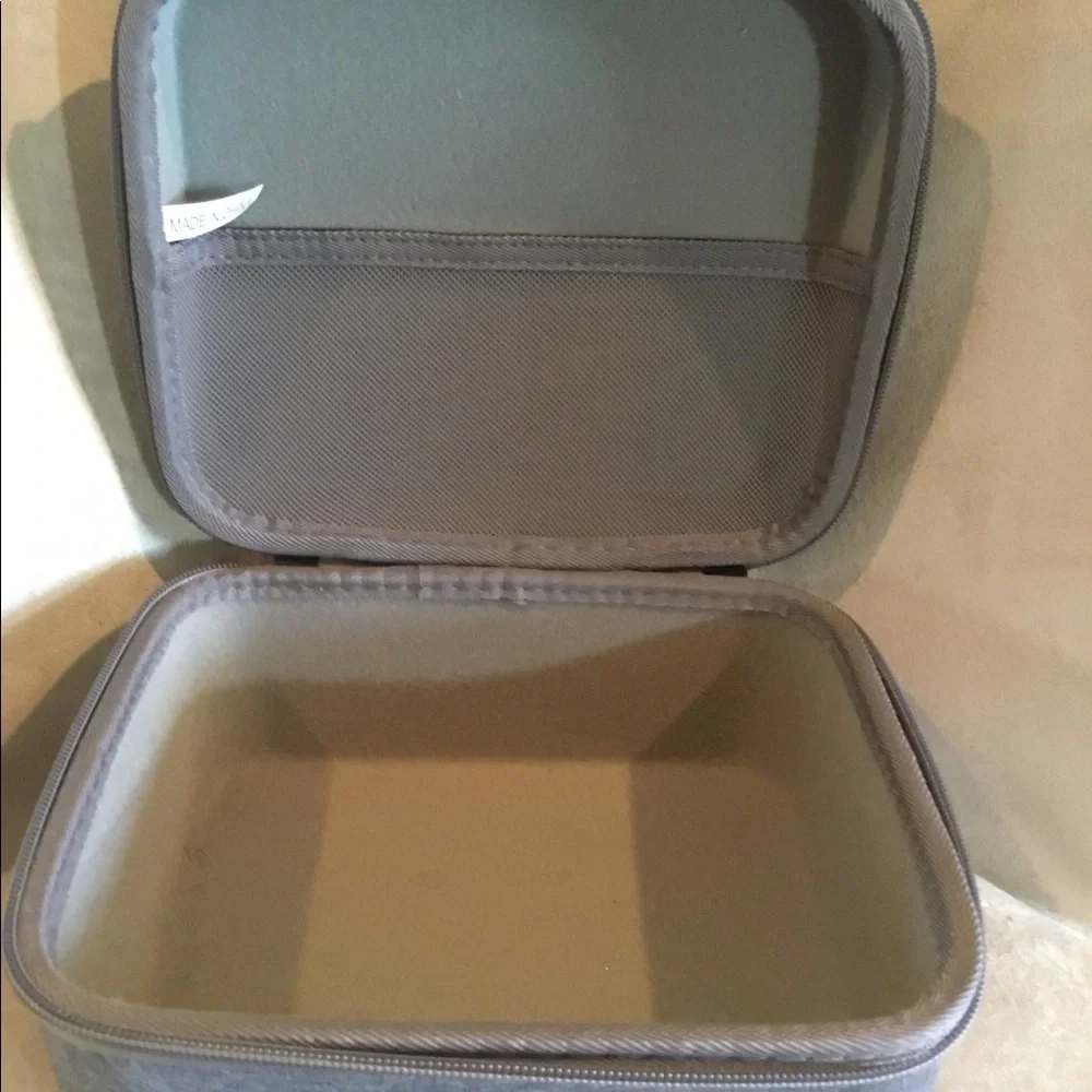 Gray Zippered Travel Container